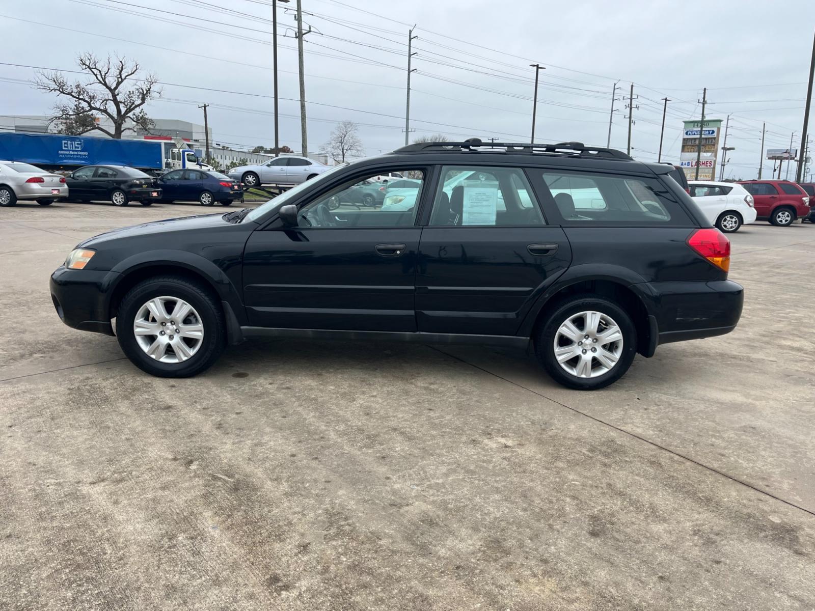 2005 Black Subaru Outback 2.5i Wagon (4S4BP61C757) with an 2.5L H4 SOHC 16V engine, 5-Speed Manual Overdrive transmission, located at 14700 Tomball Parkway 249, Houston, TX, 77086, (281) 444-2200, 29.928619, -95.504074 - Photo #3